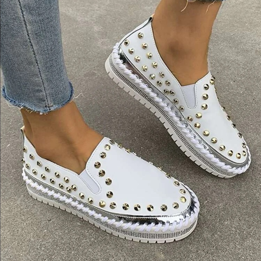 White silver studded slip ons
